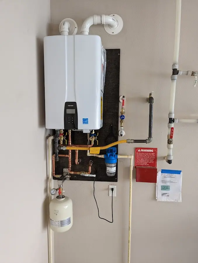 Professional plumber installing copper piping in a West Puente Valley home